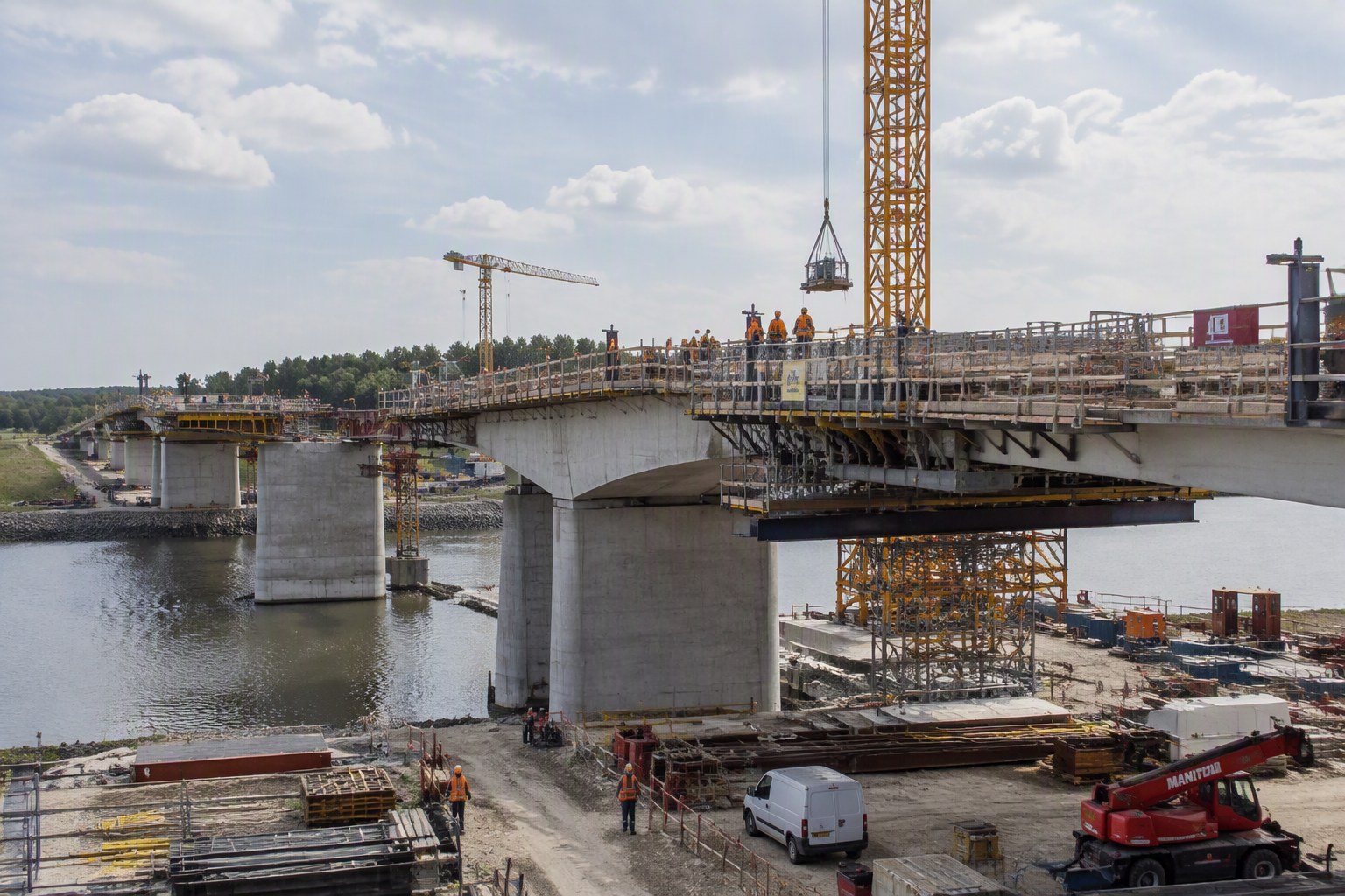bridge construction site with cranes, an infrastructure project